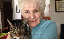 heritage society member with her cat